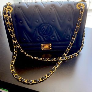 Gently used black Valentino purse